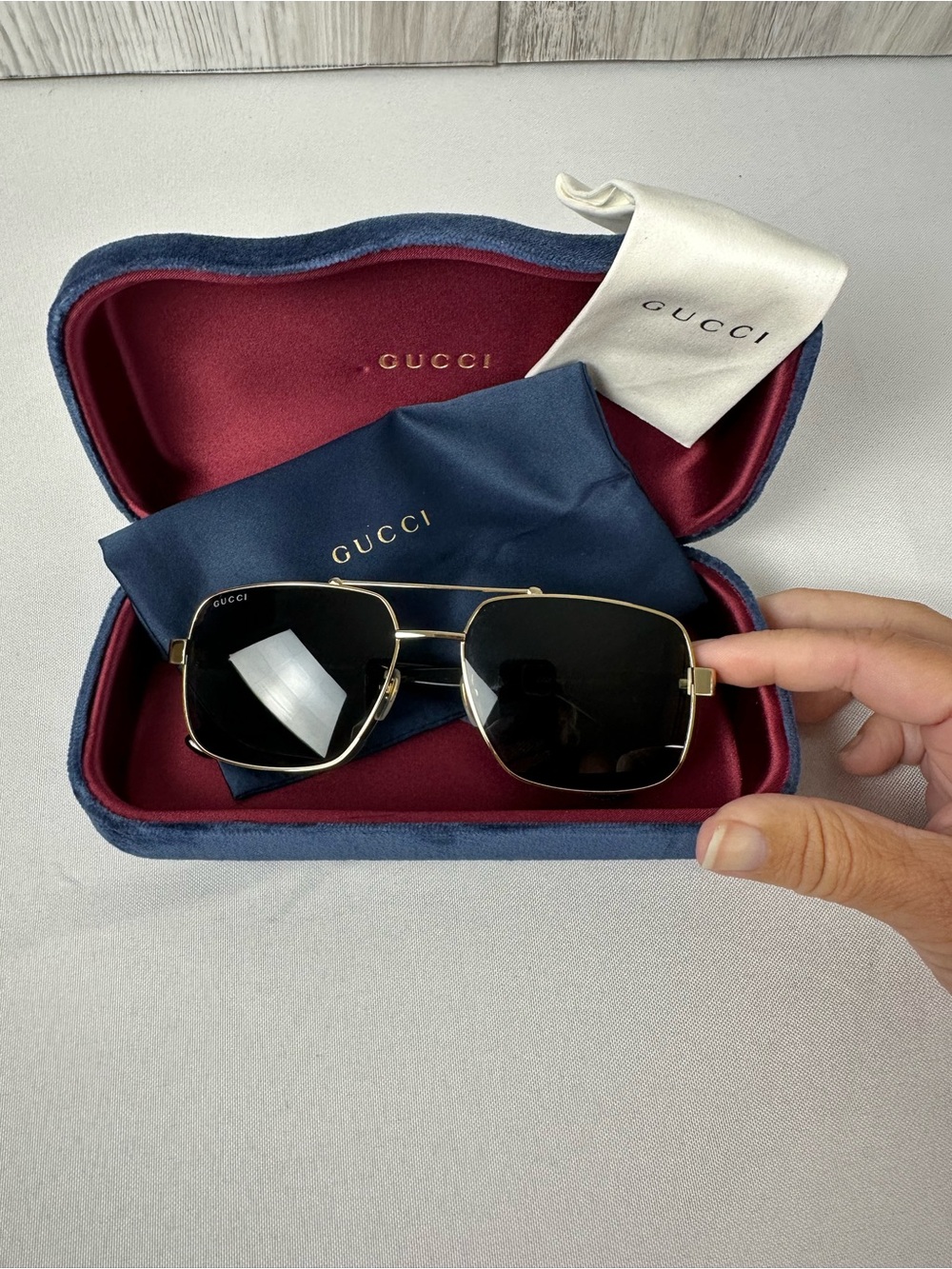 Gucci Men’s Black Lens Sunglasses with Gold Frame